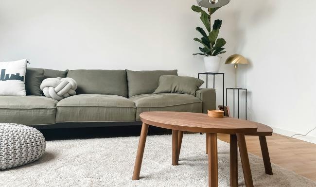 a living room with a couch and a coffee table