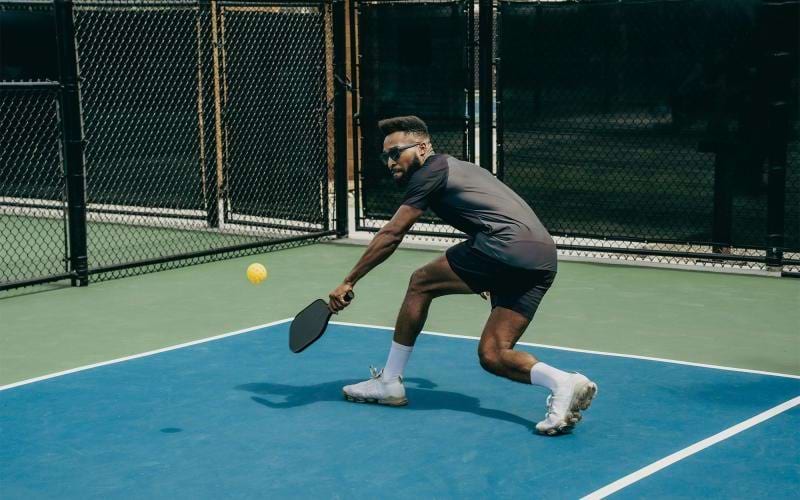 a person playing pickleball