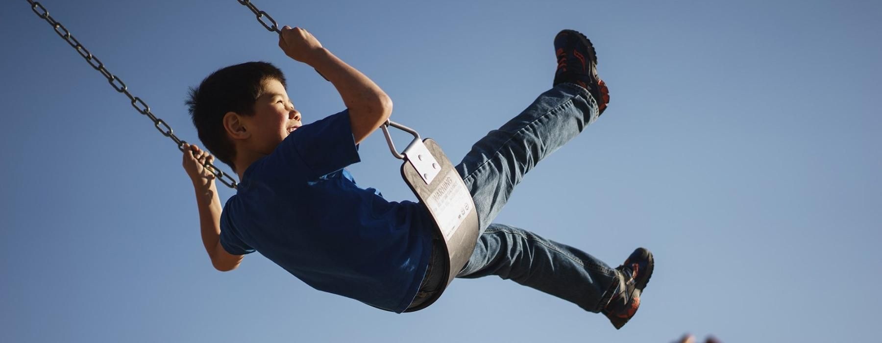 a boy on a swing